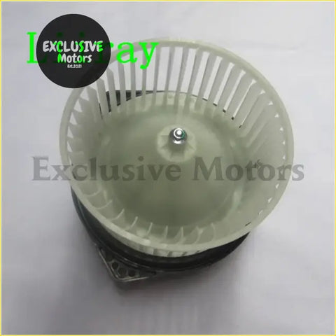 Off-white plastic ac heater blower motor fan with metallic hub and black base for isuzu d-max and amigo cars