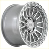 Silver alpha combat 17x9 off-road alloy wheel with machined face and intricate spoke design in 6x139.7 bolt pattern