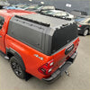 Back side view of black aluminium canopy carport cover with integrated roof rack for toyota hilux 2015-2025 sr5