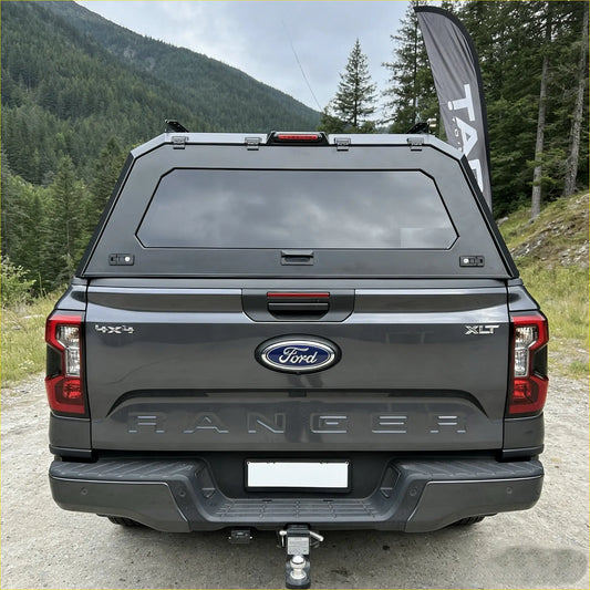 Black ford ranger xlt with matching aluminium canopy with rear view glass and rugged matte finish shown from back side