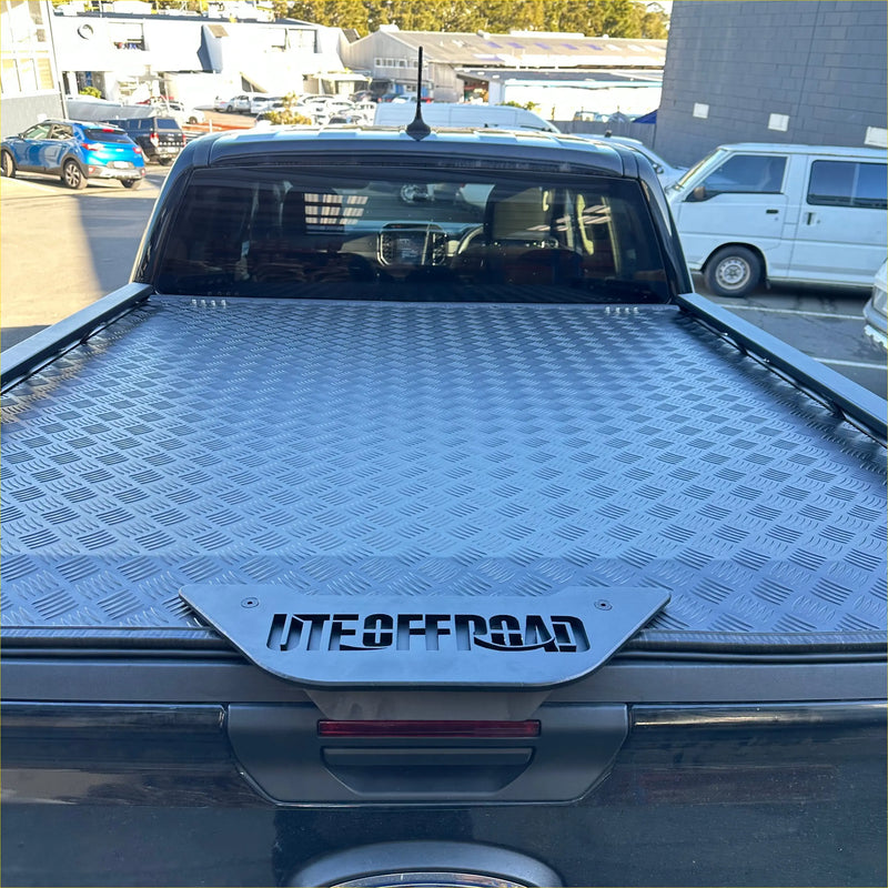 Silver diamond plate aluminum heavy-duty hard lid with lite offroad logo for byd shark 2025 truck bed liner back view