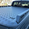 Black diamond plate aluminum heavy-duty hard lid truck bed liner with textured non-slip surface and reinforced edges for byd shark 2025+