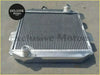 Silver aluminum radiator with rounded corners and thin vertical fins for ford capri and escort 1.3L to 2.0L models