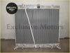 Silver aluminum radiator with ribbed core and mounting fittings for 2005-2009 toyota hiace 25l turbo diesel