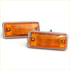 Two rectangular amber side marker lights for nissan datsun 620 with metallic silver frame and ribbed lens