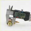 Black digital caliper measuring the brass back switch light with tubing for Nissan Datsun 521 720 ute 1968 1986
