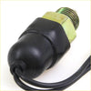 Back of black rubber-coated back switch light with brass threaded fitting and black cable for Nissan Datsun 521 and 720 ute