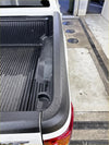 Black rubberized ford ranger bedside rail covers with textured ridges and molded contours 3 piece set 2012-2021