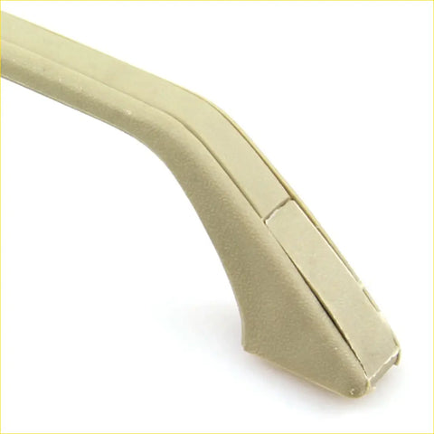 Beige plastic roof lining rail handle for nissan big-m navara 1985-1998 with smooth curved temple and subtle grooves