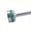 Billet aluminum oil diverter barbell with green rubber o-ring on silver metallic rod for LS1 LS2 engine use