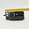 Black plastic door handle bezel for Toyota Hilux SR5 2005-2015 with textured grip and integrated latch mechanism