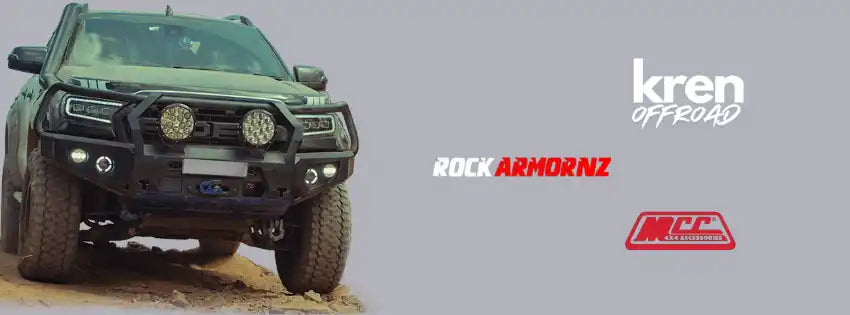 Black off-road truck with aftermarket bumper.