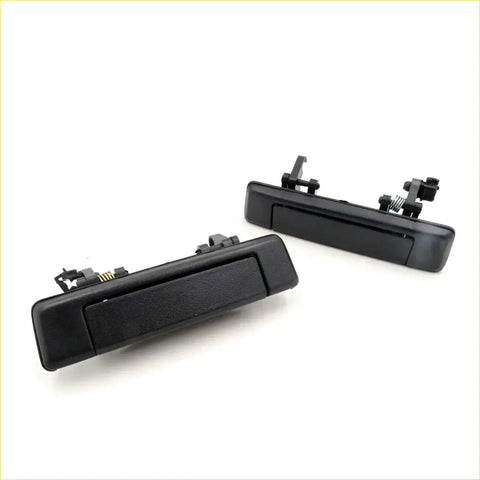 Black outer door handle set for mazda b2000 b2200 b2600 bravo showing textured grip and integrated spring mechanisms