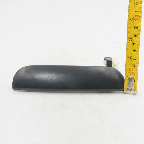 Black plastic outer door handle set for mazda b2000 b2200 b2600 bravo with smooth textured surface and rounded ends