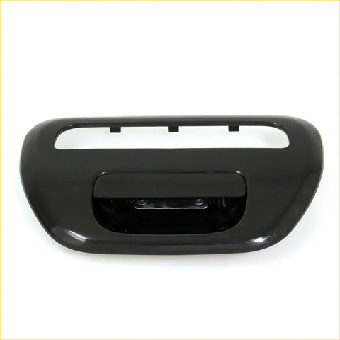 Black tailgate handle for mitsubishi l200 triton ml mn warrior made of glossy black plastic with curved design and mounting slots