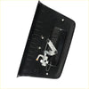 Black plastic tailgate handle cover with key hole and silver latch hardware shown from the back for nissan navara