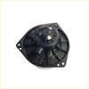 Black plastic blower motor housing with central fan and mounting holes for Nissan d22 Navara 2001-2015 back view