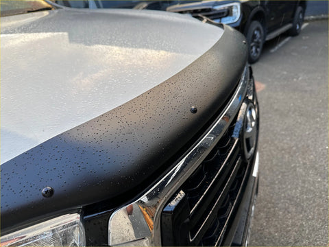 Black matte plastic bonnet guard with rivets and water droplets for monsoon toyota hilux 2015-2020