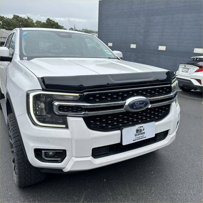 White ford ranger 2022 with black bonnet guard stone protector and chrome grille for new ranger models