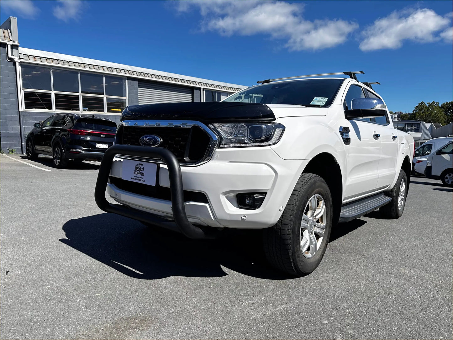 White ford ranger pickup with black front bull bar and bonnet guard protector stone guard 2016-2021 model