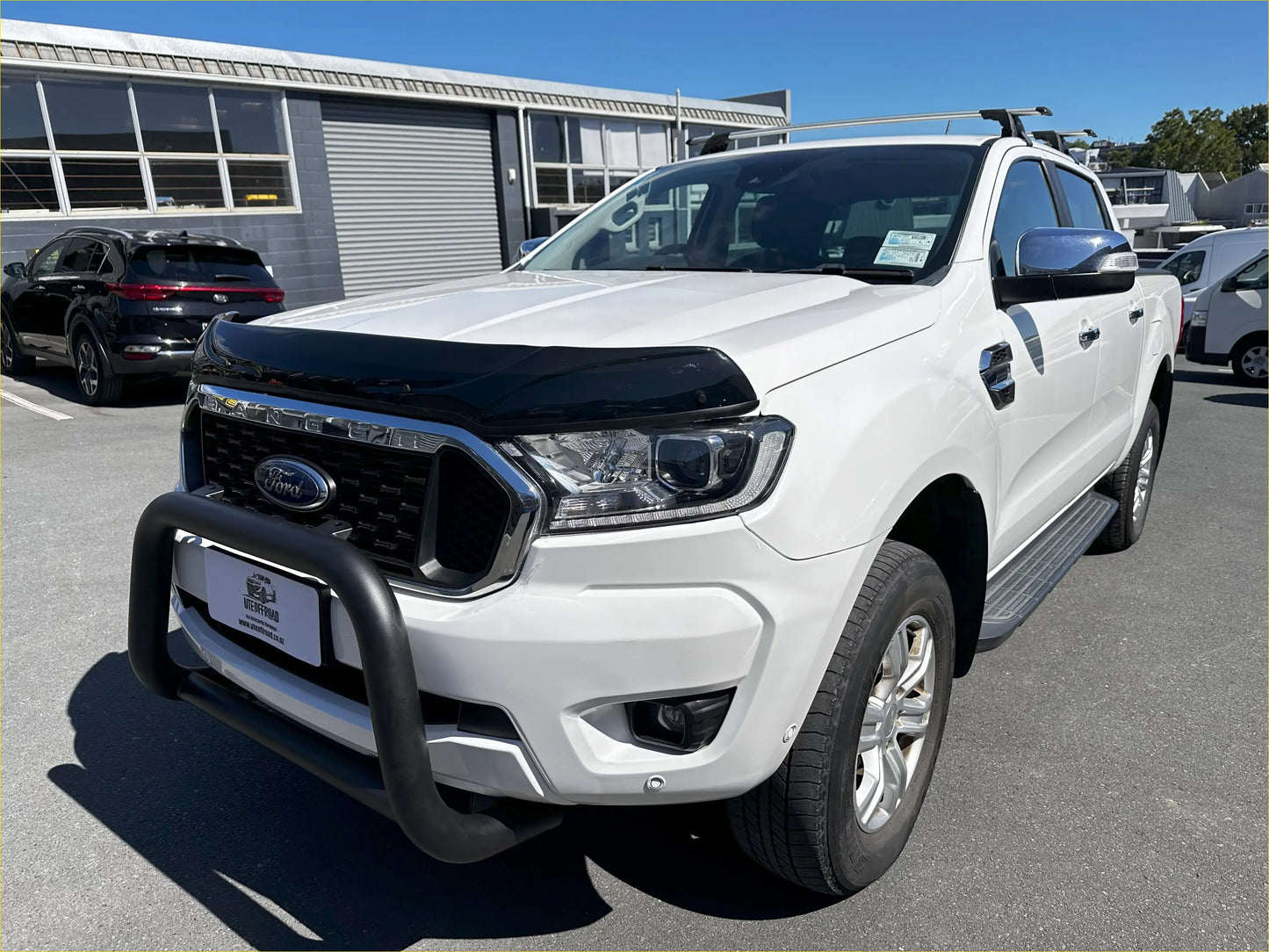 White ford ranger with black front bumper guard and chrome accents featuring bonnet guard protector stone guard PX2 PX3 2016-2021