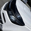 The sleek white headlight with black trim shown with bonnet guard protector stone guard for holden colorado trailblazer