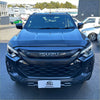 Black isuzu d-max 2024 with bold front grille and sleek led headlights featuring bonnet guard protector stone guard