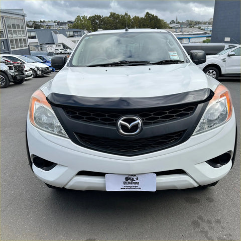 White mazda bt-50 pickup truck with black bonnet guard protector stone guard from 2012-2020 with chrome emblem