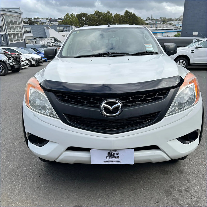 White mazda bt-50 pickup truck with black bonnet guard protector stone guard from 2012-2020 with chrome emblem