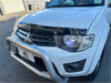 White mitsubishi triton pickup with silver metal front bumper guard featuring bonnet guard protector stone guard