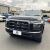 Black mitsubishi triton 2024 with bold grille and sleek headlights featuring a bonnet guard protector stone guard