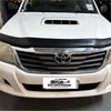 Black plastic bonnet guard protector with integrated vent matte black on white toyota hilux 2012-2015
