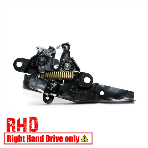 Black plastic and metal right-hand drive bonnet latch striker lock with visible coil spring for toyota hilux 2004-2015