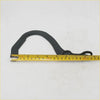 Black rubber handle with curved ergonomic design and reinforced grip for bonnet lock hinge on Toyota Hilux 4Runner
