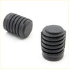 Black rubber shock absorber caps with ribbed texture and circular ends for bonnet rubber bumper on nissan datsun 720 ute
