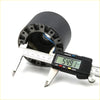 Black cylindrical motor housing with internal wiring and digital caliper measuring diameter for toyota hilux hub adapter