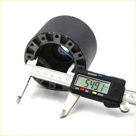 Black cylindrical motor housing with internal wiring measured by digital caliper for boss kit steering wheel hub adapter for toyota hilux