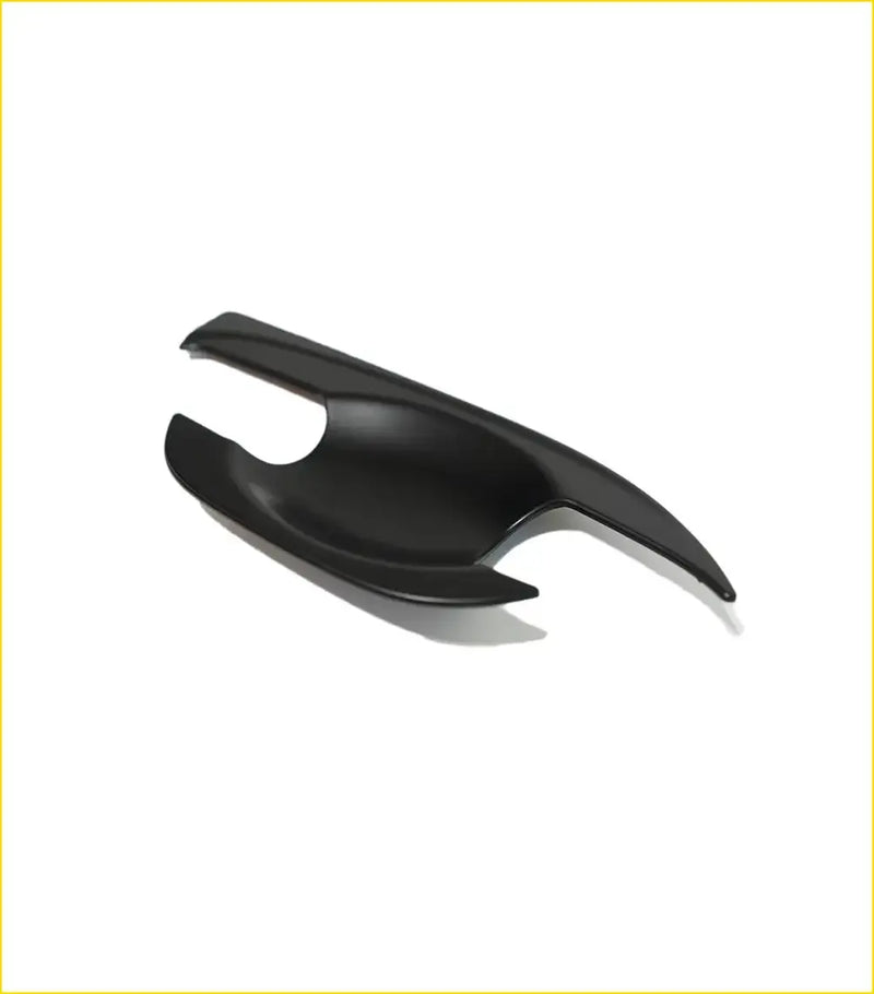 Black glossy plastic car door handle cover with sleek curved design for colorado trailblazer bowl inserts
