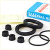 Black rubber disc brake seal kit components for brake caliper dust cover kit used on Nissan Datsun King Cab 720