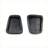 Black rubber brake clutch pedal pads with textured slightly worn surface and reinforced edges for mazda familia coupe 1963-1968