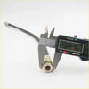 Black rubber brake hose with brass fittings being measured by digital caliper for nissan datsun 521 ute 1968-1973