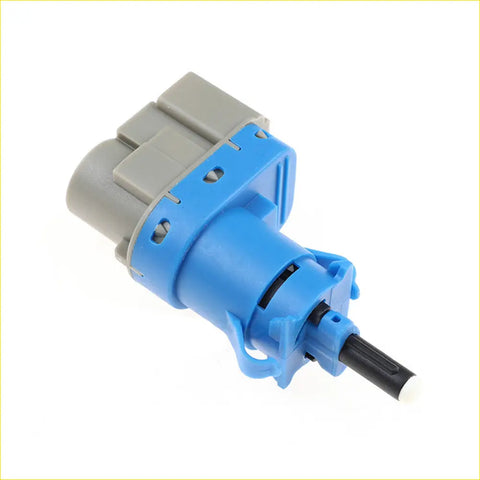 Blue and gray plastic brake light switch with black cylindrical protrusion suitable for ford falcon bf fg fgx and territory sx