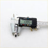 Metallic spark plug with black tip and threaded body measured by digital caliper for nissan datsun bluebird brake lightswitch