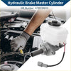 White plastic brake master cylinder reservoir with black cap attached to metallic hydraulic assembly for toyota hiace