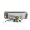 Gray plastic bumper turn signal light with yellow lens and exposed wiring for toyota hilux 1988-1997 back side view