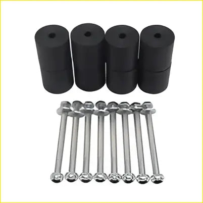 Black cylindrical rubber dampeners with silver metal rods in 2 inch body lift kit for hilux 1984 to 1997 dual cab