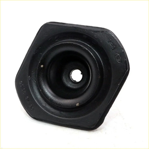 Black hexagonal rubber cabin mounting base support with central hole and molded markings for Nissan Datsun 720