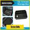 Black plastic car armrest storage box with textured interior and molded compartments for toyota center console