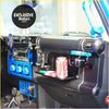Blue aftermarket radio with circular knobs and carbon fiber accents shown with car passenger tray table for toyota fj cruiser