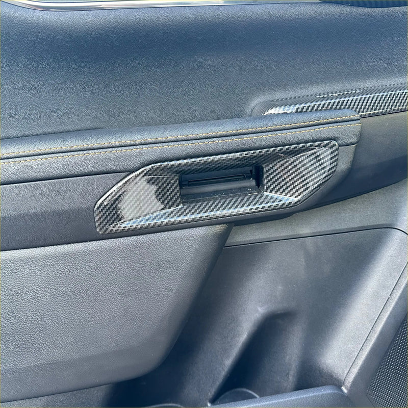 Carbon fiber interior door handle panel trim cover for ford ranger with sleek glossy finish and window control cutout